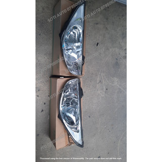 Đèn pha Hyundai Tucson 2011