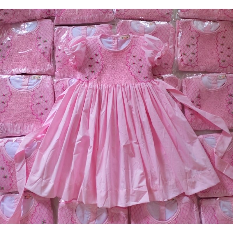 Đầm Smock hồng tay búp cho bé gái 10kg - 32kg