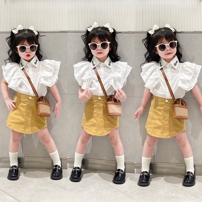 Áo sơmi thêu cổ chữ kèm chân váy kaki jean