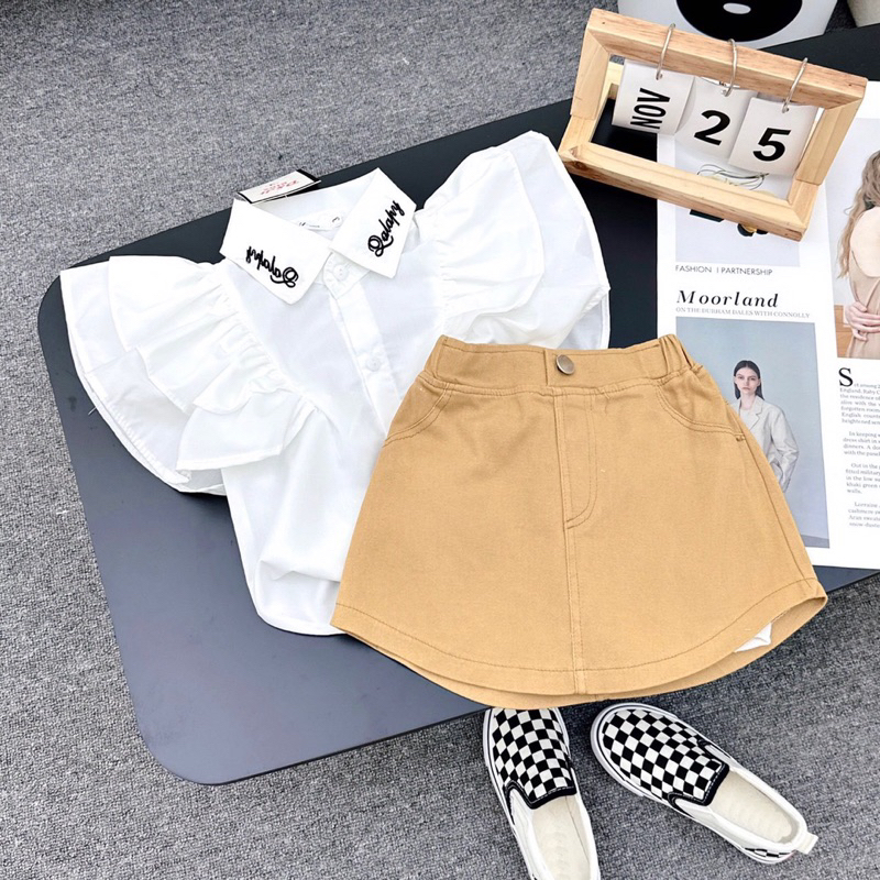 Áo sơmi thêu cổ chữ kèm chân váy kaki jean