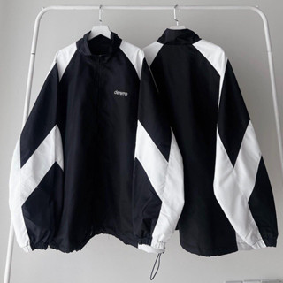  Áo Khoác Gió DERERRO chữ thêu chất liệu dù 3 màu trẻ trung năng động. 