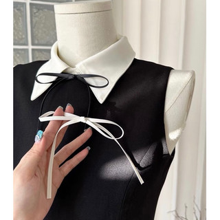 Đầm đen phối xếp li trắng
