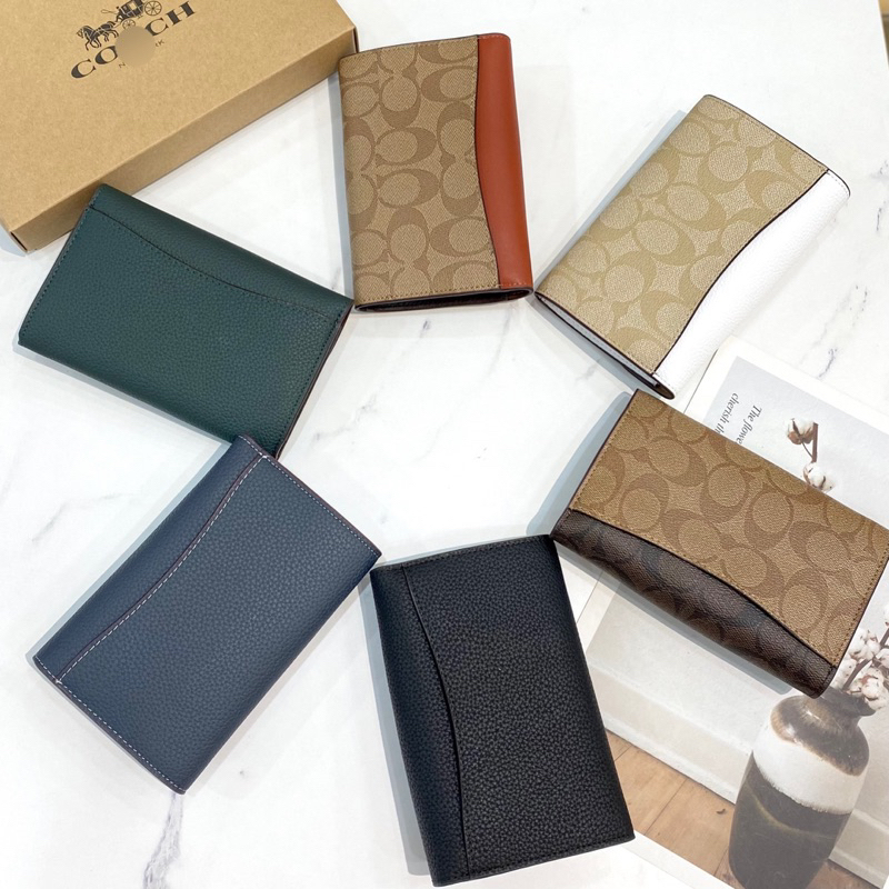 Ví coach kleo nắp gập