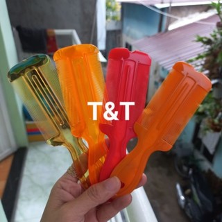 Lược chải chí,chải gàu nhựa cứng có tay cầm (Màu cam)