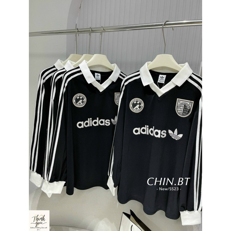 Áo tay dài hoạ tiết viền sọc cổ sơ mi