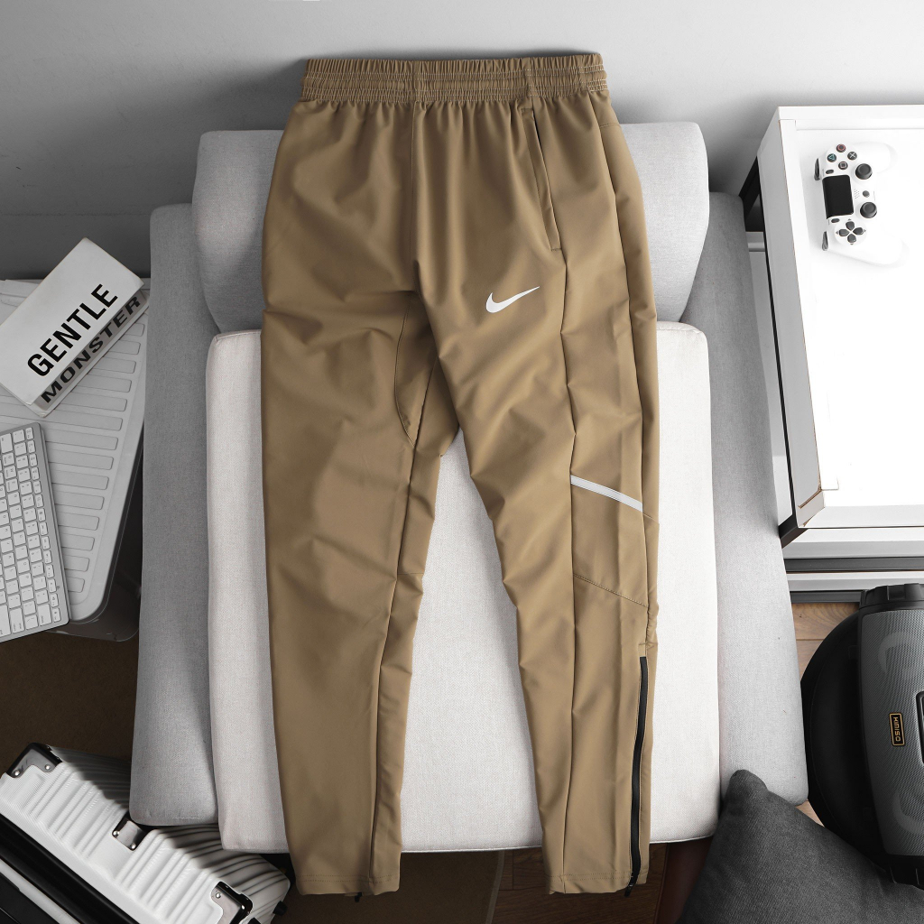 Quần thun thể thao nam tập gym lưng thun dây rút ống quần khóa kéo vải Xi dù 3 màu - NK