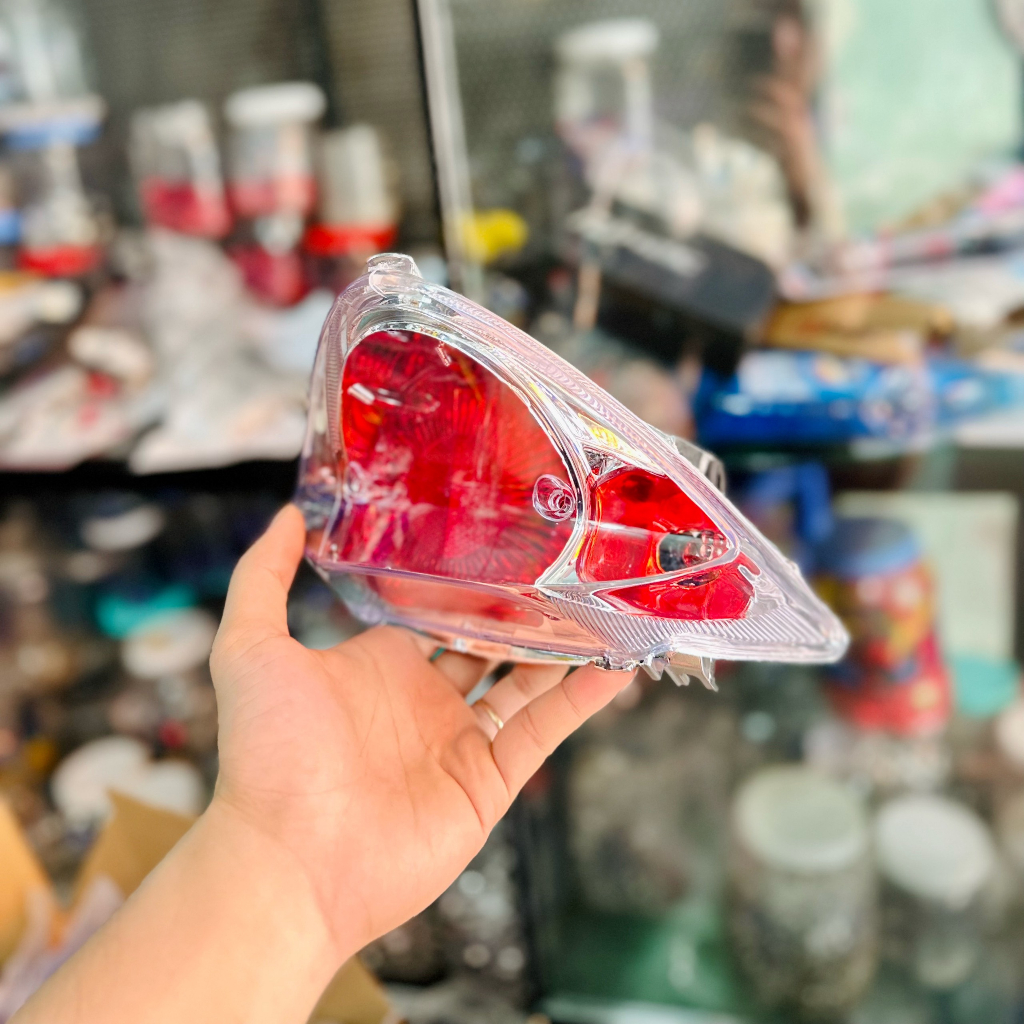 Meca đèn lái sau Spark Exciter 135 4S Sirius