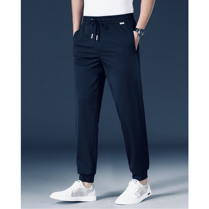 Quần dài thể thao nam vải POLY co giãn cạp thun dây rút