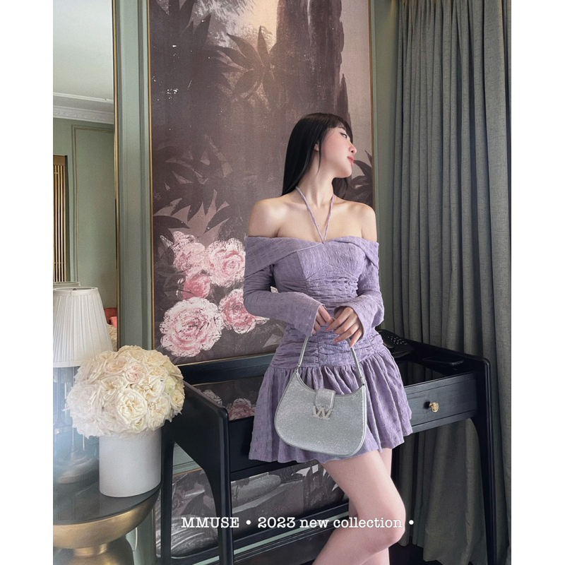 Đầm trễ gân tay dài