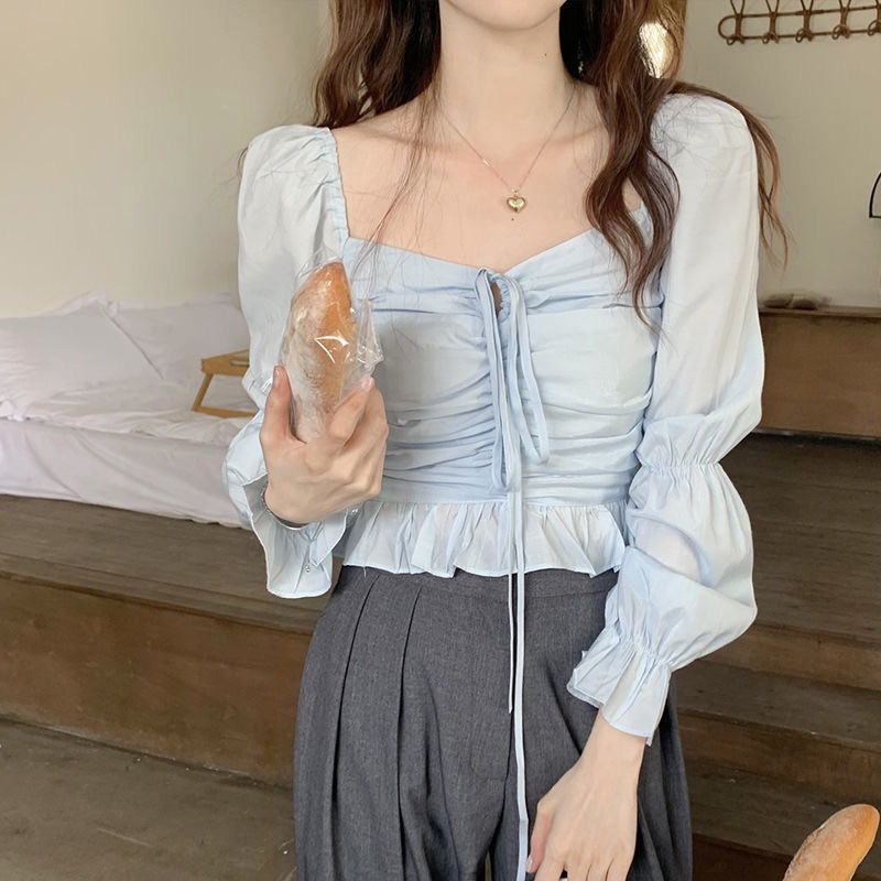 Áo kiểu croptop Herbi dài tay bo eo tay bèo phối dây thắt ngực tôn dáng 2 màu đen và trắng thời trang nữ