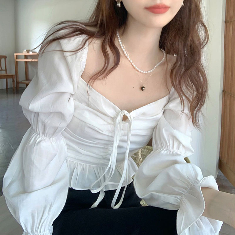 Áo kiểu croptop Herbi dài tay bo eo tay bèo phối dây thắt ngực tôn dáng 2 màu đen và trắng thời trang nữ