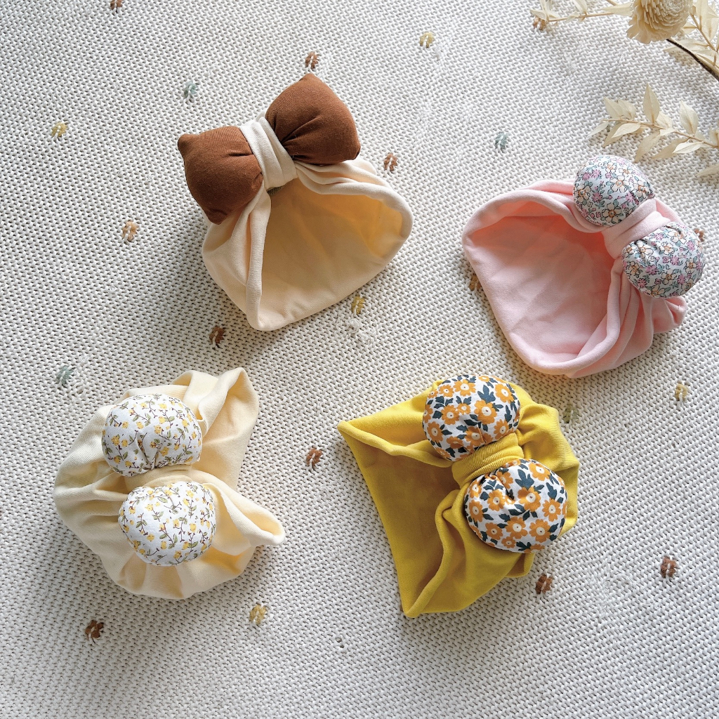 🅷.🄴🅅🄰🄽  Nón vải turban thắt nơ cho bé gái, thun co giãn tốt, nhẹ nhàng trùm kín tai bé.