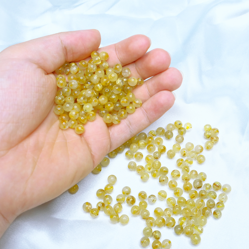 Hạt đá tóc vàng 5,6 đến 6mm thiên nhiên UPCARA