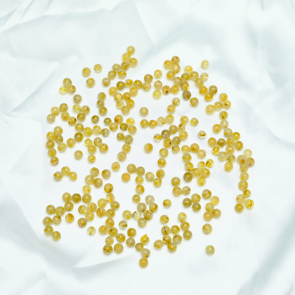 Hạt đá tóc vàng 5,6 đến 6mm thiên nhiên UPCARA