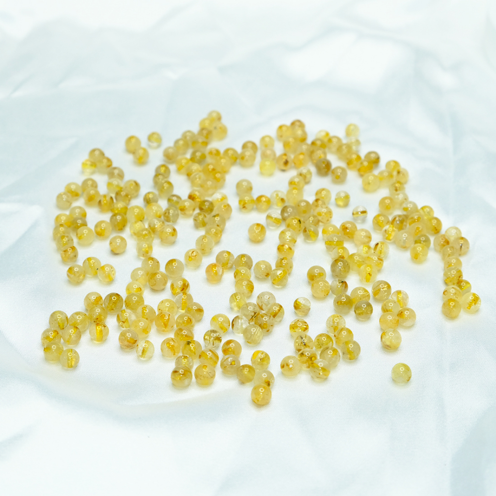 Hạt đá tóc vàng 5,6 đến 6mm thiên nhiên UPCARA