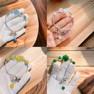 Vòng tay tóc vàng phối bi bạc