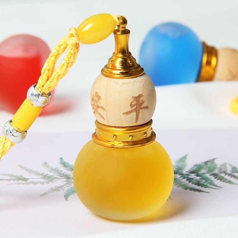 Tinh dầu nước hoa đựng trong bầu hồ lô trang trí trong xe hơi ô tô, khử mùi