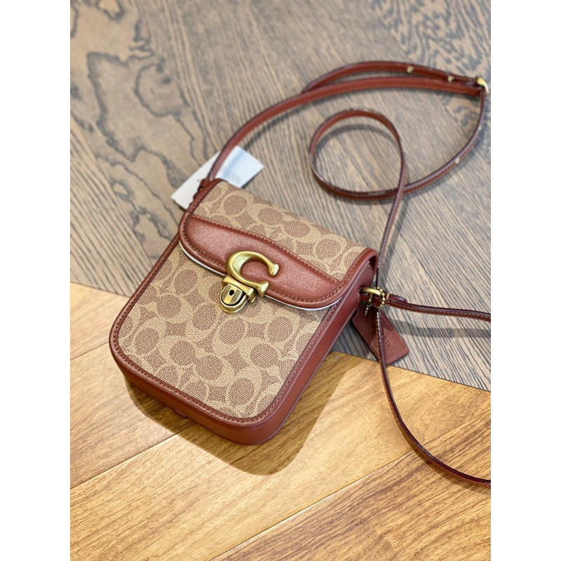 Túi coach tall studio đeo chéo