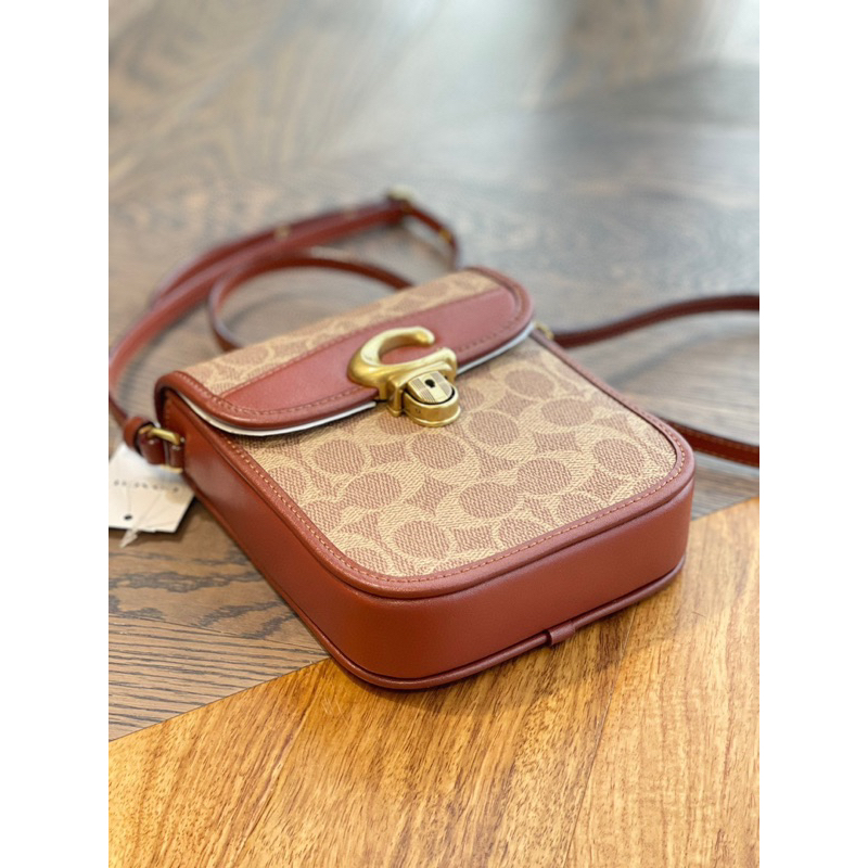 Túi coach tall studio đeo chéo