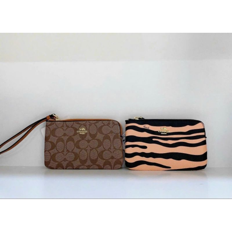Ví nữ cầm tay Coach kèm móc đeo dáng ví dẹp chất liệu da PU khóa zip màu sắc sang chảnh