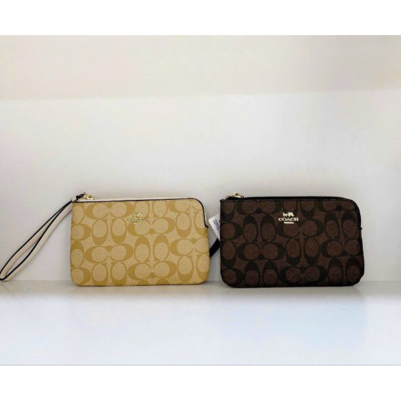 Ví nữ cầm tay Coach kèm móc đeo dáng ví dẹp chất liệu da PU khóa zip màu sắc sang chảnh