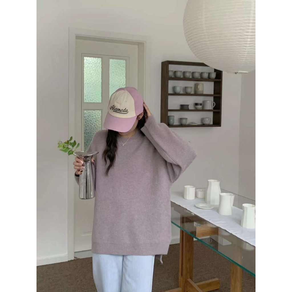 Áo len trơn xẻ vạt cao thấp dáng rộng
