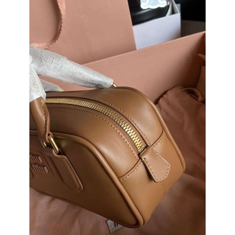 Túi miumiu tay cầm