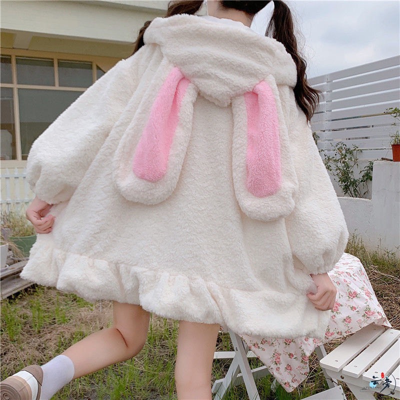 Áo khoác lông tại thỏ dài giấu quần cute cho các nàng