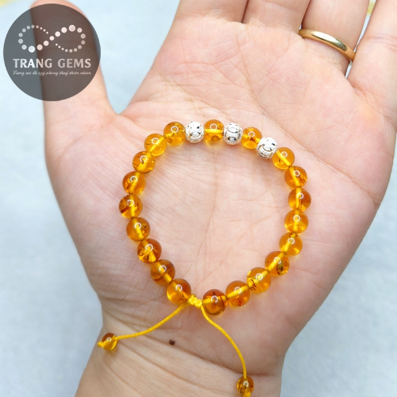 Vòng tay hô -phách charm bạc