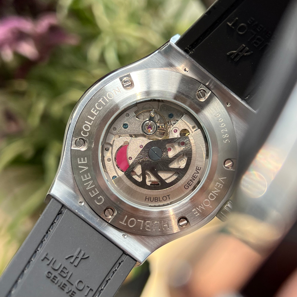 Đồng hồ Hu-blot Nam cao cấp vành đá mặt đá đá vỏ trắng mặt trắng chạy cơ automatic dây cao su, dây da 42mm