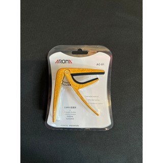 Capo Aroma nâng giảm tone guitar