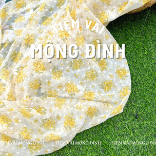Vải voan ép kim óng ánh in bông vàng nền kem nền nã