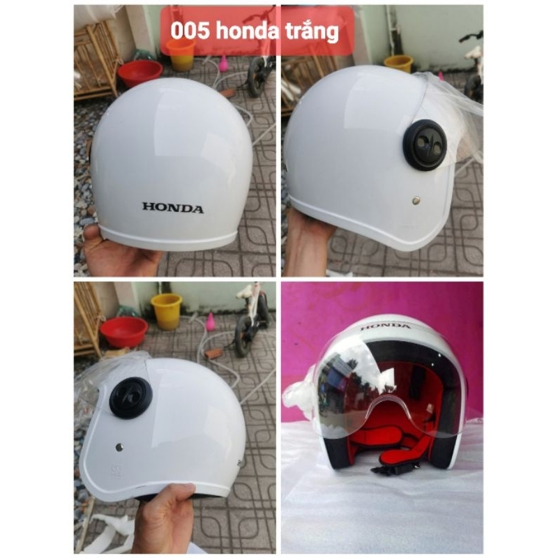 Nón Honda trắng  3/4 có trầy xước do vận chuyển.