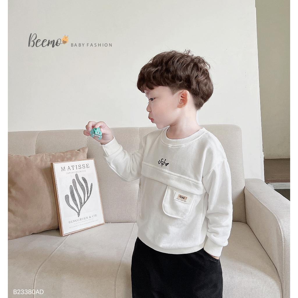 Áo sweater dài tay thân phối túi ngực tag da Beemo cho bé