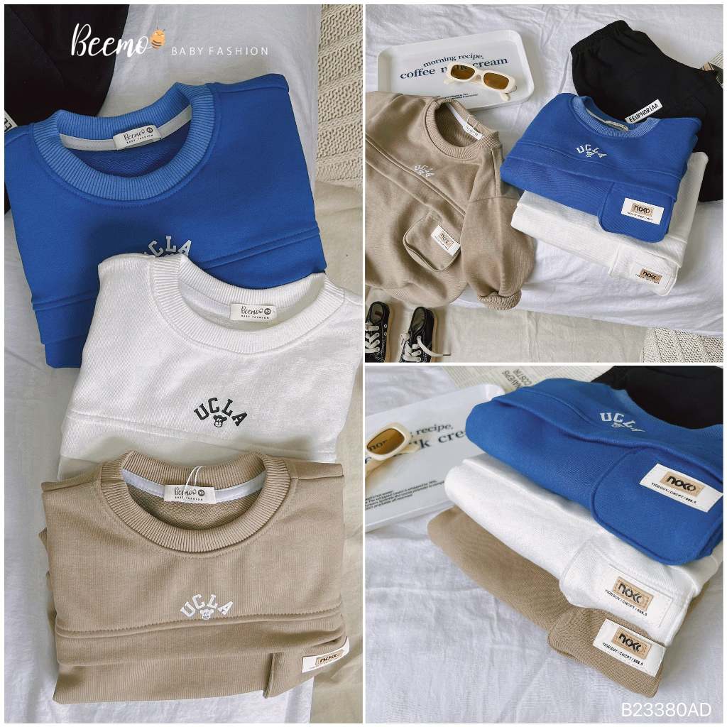 Áo sweater dài tay thân phối túi ngực tag da Beemo cho bé