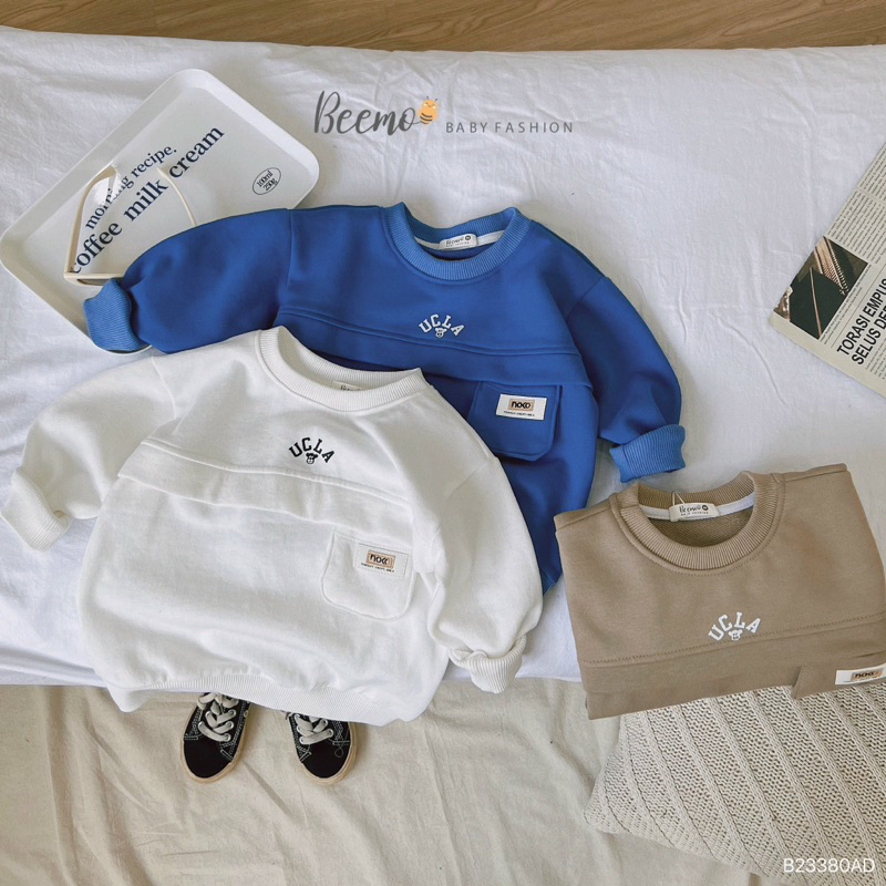 ÁO SWEATER THÂN PHỐI TÚI NGỰC TAG DA CHO BÉ