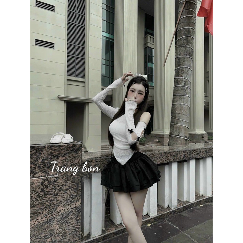 SET ÁO LEN LỆCH VAI ĐÍNH NƠ TAY DÀI VẠT NHỌN PHỐI CHÂN VÁY TẦNG