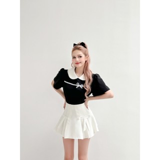 Chân váy Mixie Skirt xoè nhẹ dập ly đính nơ trắng aguja
