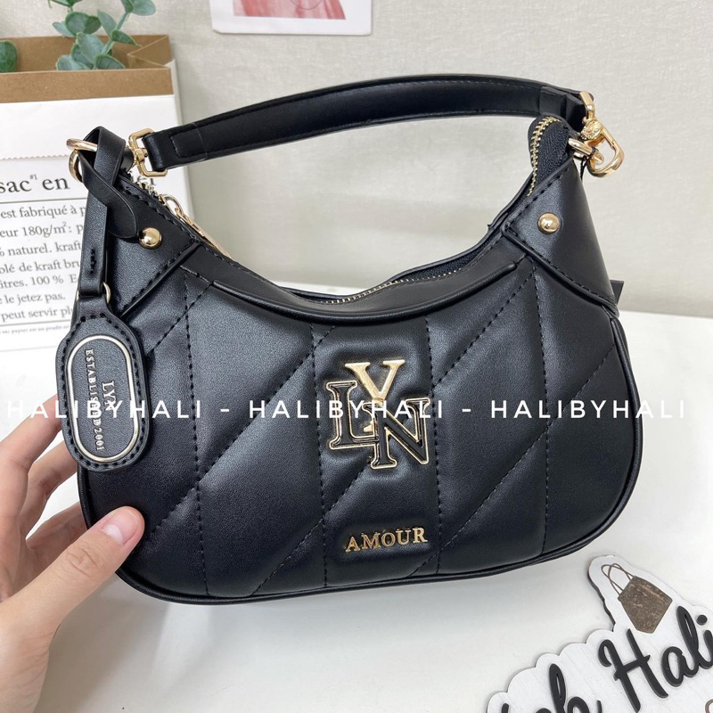 Túi lyn trám dáng bầu kèm quai xách và dây đeo chéo kiểu dáng lịch sự sang trọng hợp thời trang