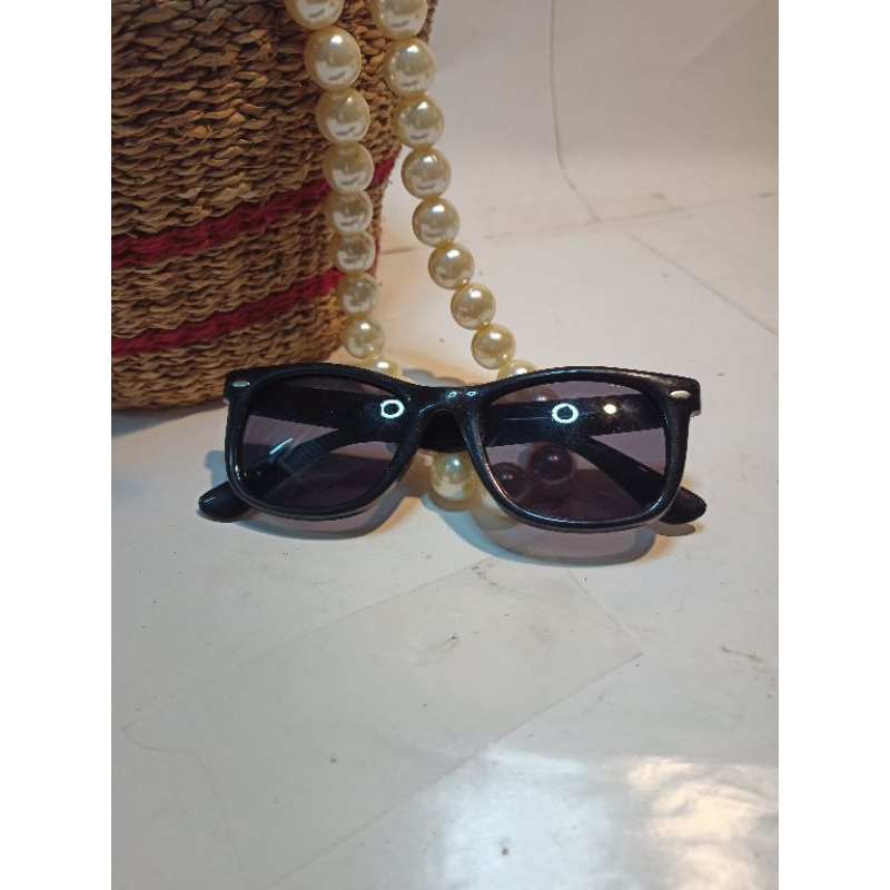 Gọng kính mát si Nhật Bản.