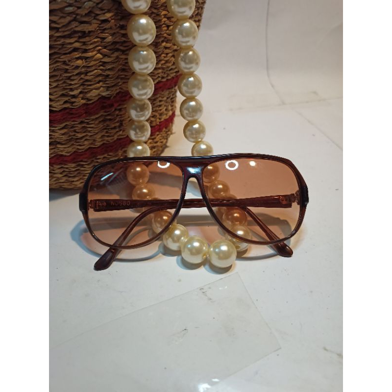 Gọng kính mát si Nhật Bản.