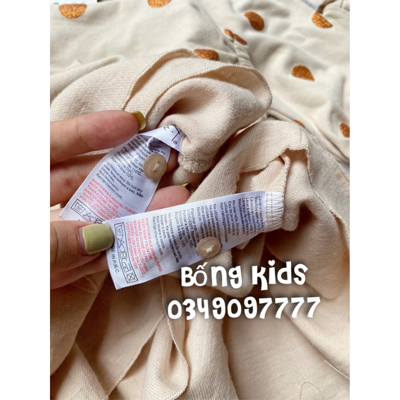 Váy Nỉ Bé Gái Cổ Bèo Chấm Bi Nhũ Be Nude Dadati