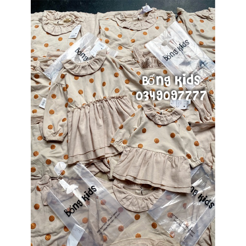 Váy Nỉ Bé Gái Cổ Bèo Chấm Bi Nhũ Be Nude Dadati