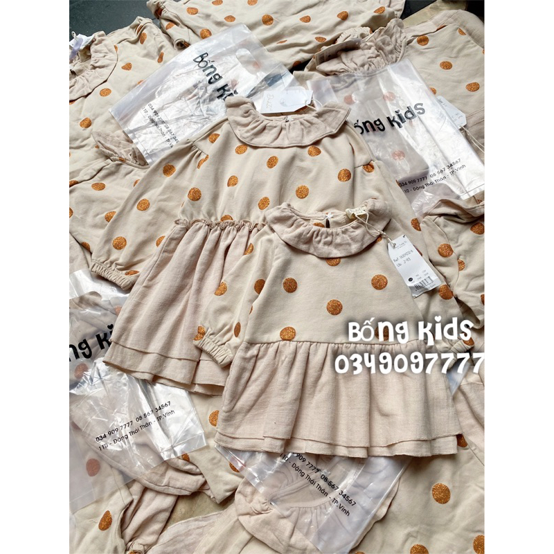 Váy Nỉ Bé Gái Cổ Bèo Chấm Bi Nhũ Be Nude Dadati