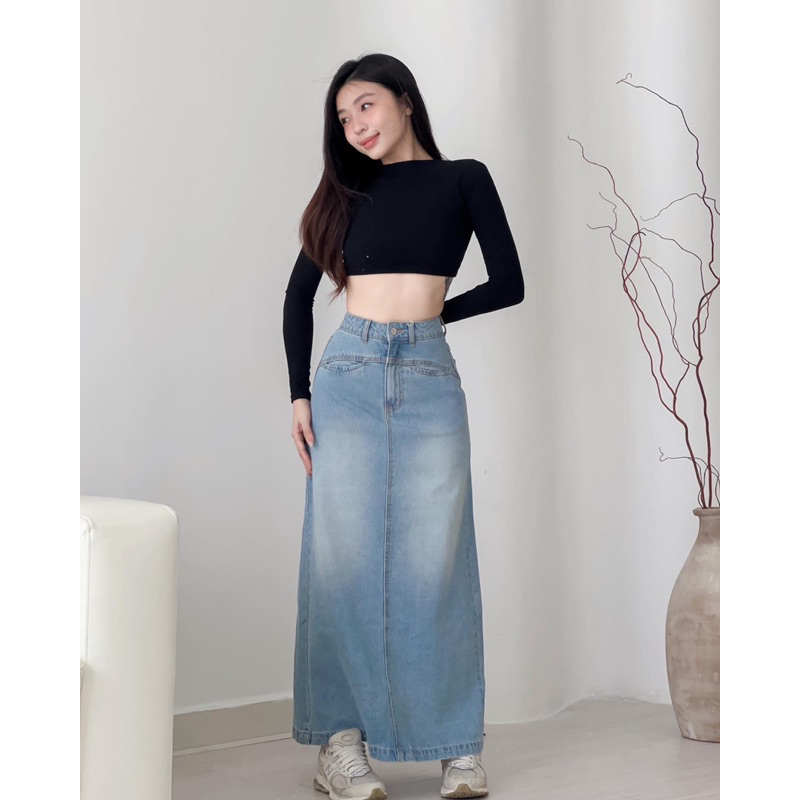 Chân váy dáng dài túi khoét giọt nước xẻ sau