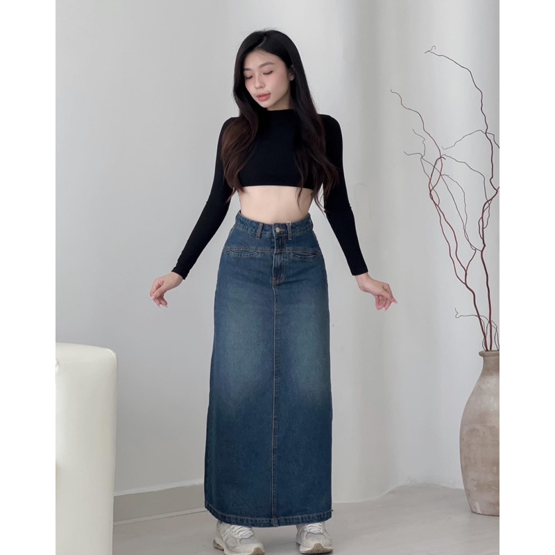 Chân váy dáng dài túi khoét giọt nước xẻ sau