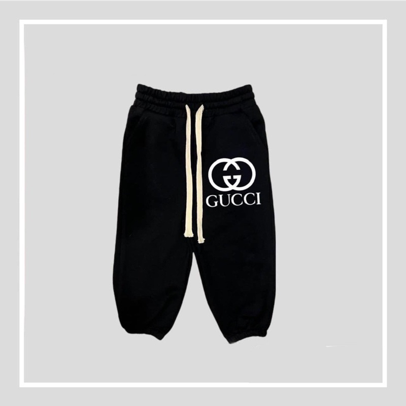 Quần nỉ joger da cá màu đen in hình logo cho bé trai bé gái size từ 12-40 cân