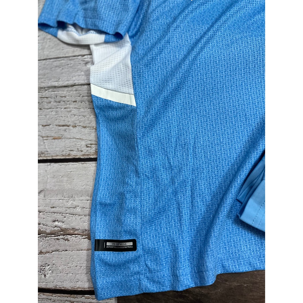 Set bộ bóng đá MC 2021 sân nhà màu xanh quần xẻ tà