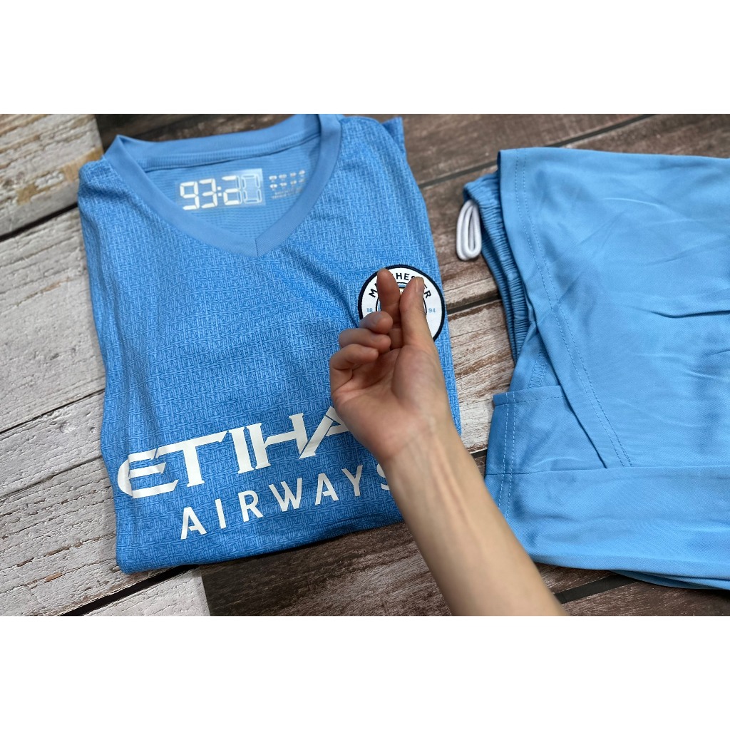 Set bộ bóng đá MC 2021 sân nhà màu xanh quần xẻ tà