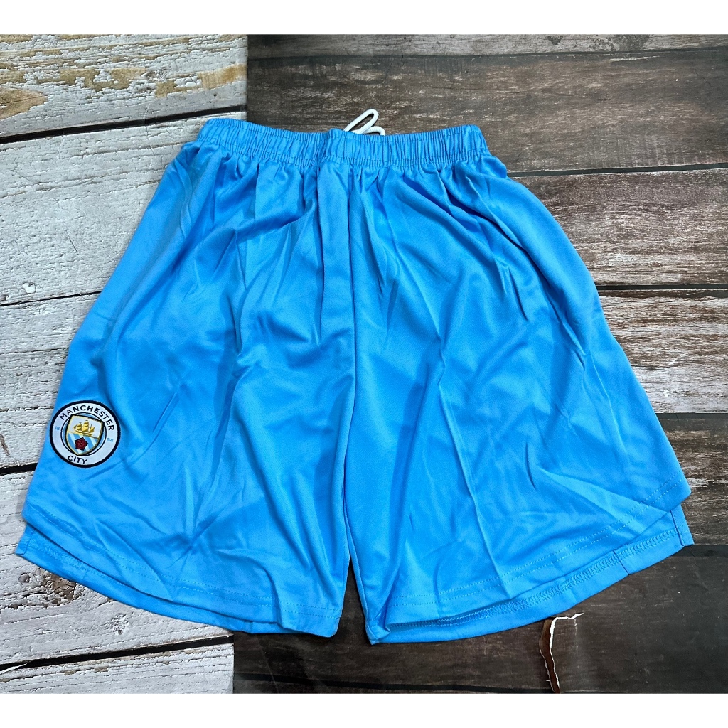 Set bộ bóng đá MC 2021 sân nhà màu xanh quần xẻ tà